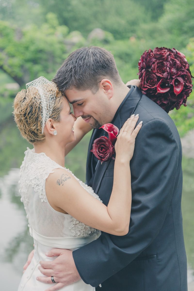 Kiss under the arcade at Bethesda Terrace - Central Park Wedding - New York City
