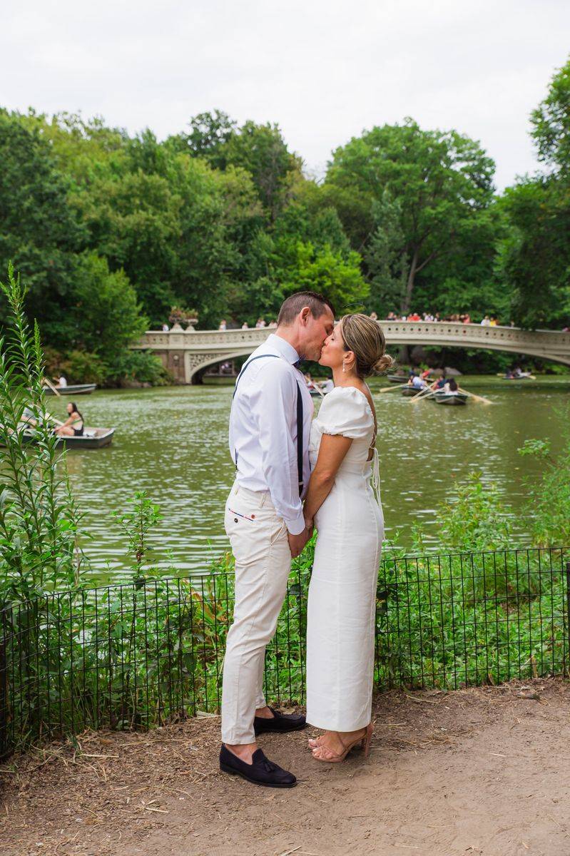 Lakeside kiss at Bow Bridge - Central Park Wedding - New York City